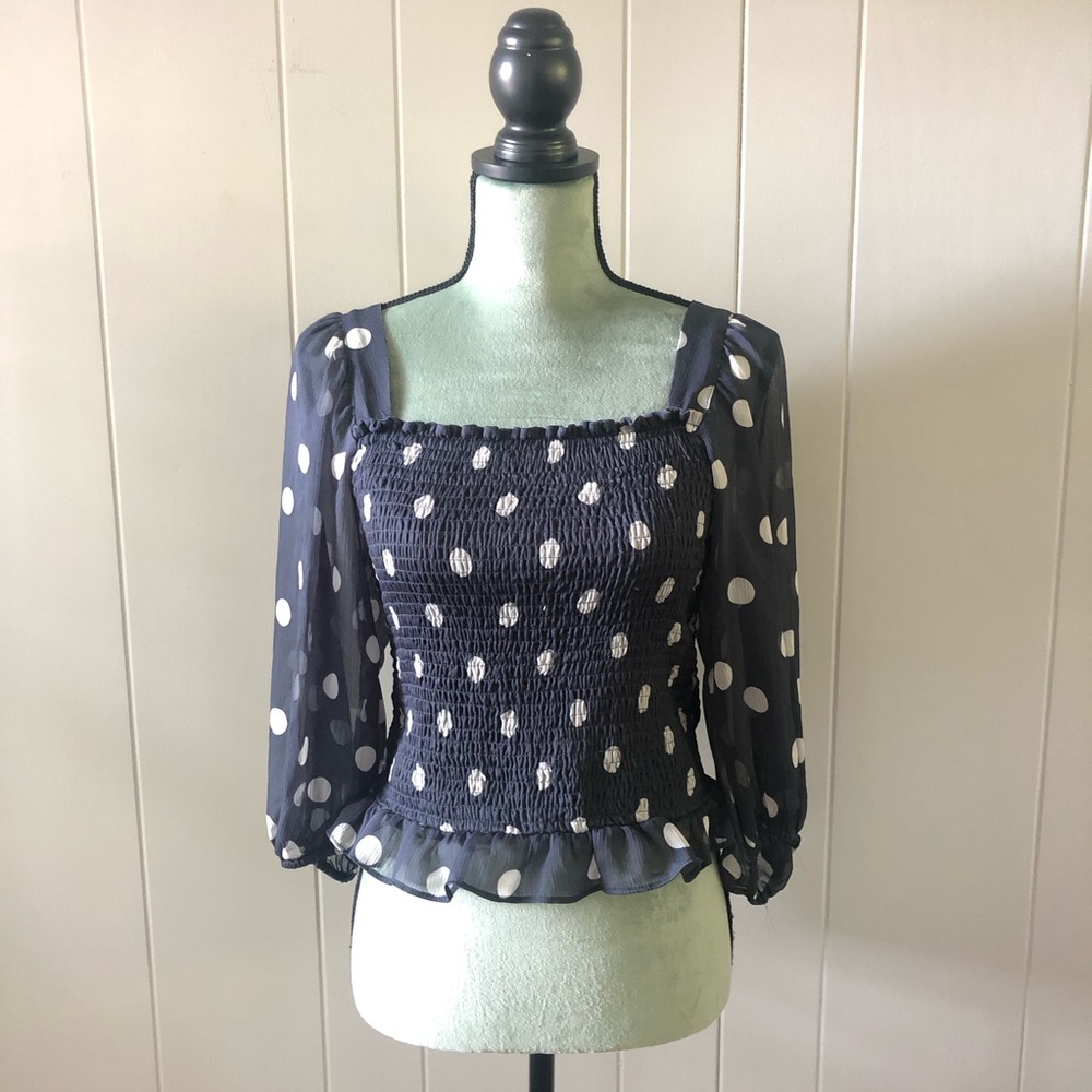 Black and white polka dot blouse